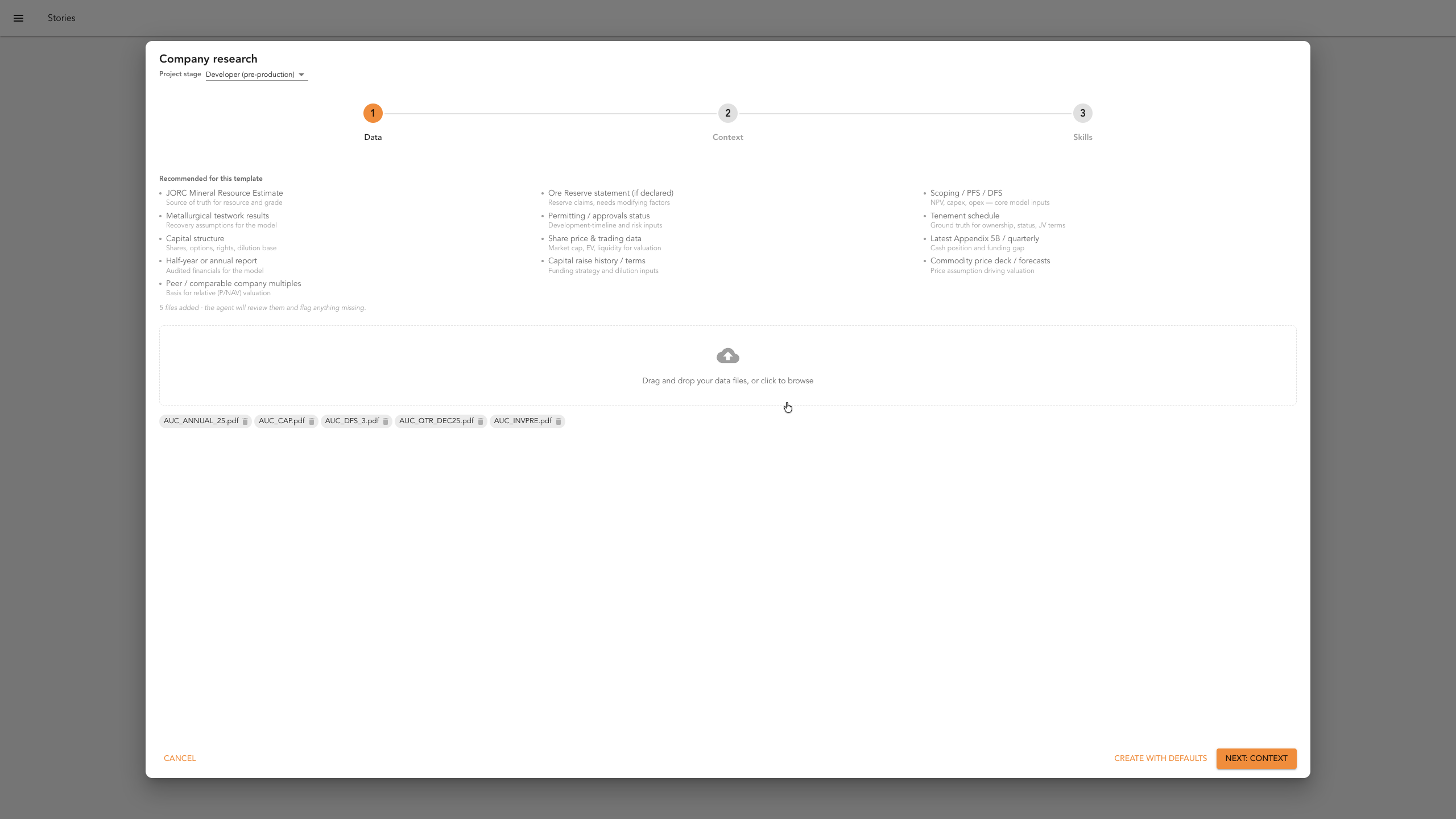 The data upload step with company filings attached and the Next button