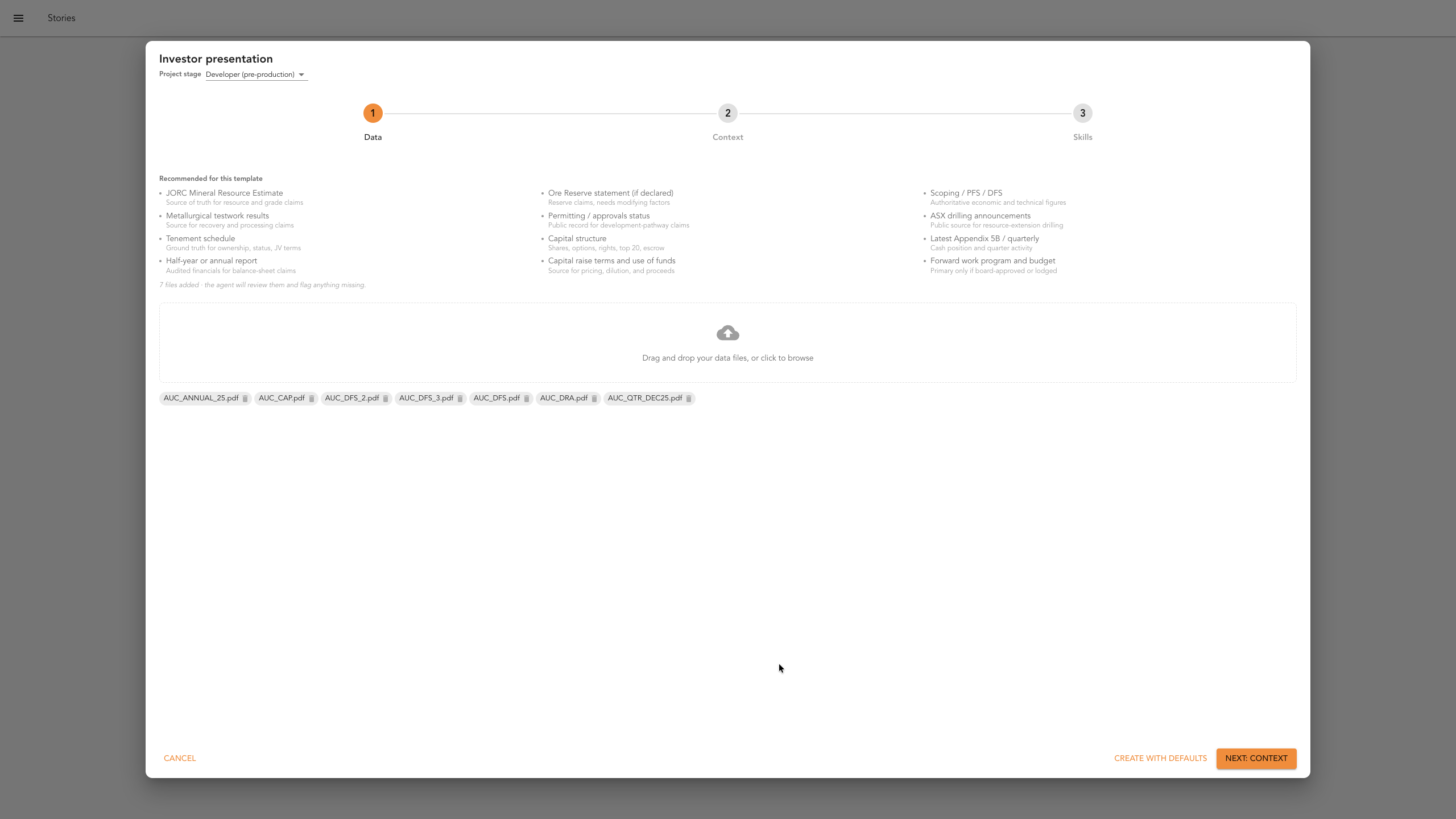 The data upload step with company filings attached and the Next button